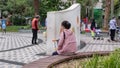 Shenzhen, China: Women`s parents take their children to play in the park Royalty Free Stock Photo