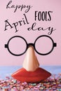 Novelty glasses and text happy april fools day Royalty Free Stock Photo
