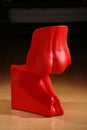 Novelty red chair in the shape of the lower half of the human body