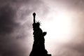 November 2018 - Backlight view of American symbol Statue of Liberty silhouette in New York, USA Royalty Free Stock Photo