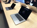 November 2019 Bologna, Italy: Macbooks computers on display in Apple store close-up across shoppers