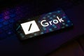 November 6, 2023, Brazil. The Grok logo is displayed on a smartphone screen. Grok is an artificial