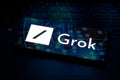 November 6, 2023, Brazil. The Grok logo is displayed on a smartphone screen. Grok is an artificial