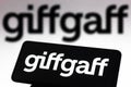 November 23, 2021, Brazil. In this photo illustration the Giffgaff logo seen displayed on a smartphone screen and in the