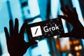 November 6, 2023, Brazil. The Grok logo is displayed on a smartphone screen. Grok is an artificial