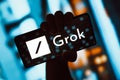 November 6, 2023, Brazil. The Grok logo is displayed on a smartphone screen. Grok is an artificial