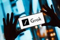 November 6, 2023, Brazil. The Grok logo is displayed on a smartphone screen. Grok is an artificial