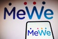 November 22, 2022, Brazil. In this photo illustration, the MeWe logo is displayed on a smartphone screen