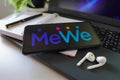 November 22, 2022, Brazil. In this photo illustration, the MeWe logo is displayed on a smartphone screen