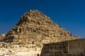 NOVEMBER 13, 2019, CAIRO, EGYPT - People climbing pyramid at The Great Pyramids of Giza, Cairo, Egypt