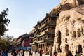 November 2014 - Datong, China - Tourists exploring the Yungang Grottoes