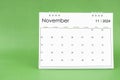 November 2024 desk calendar isolated in green.