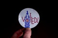 November 3, 2020 - Elkins Park, Pennsylvania: An Election Day Sticker Held by a Hand That Says I Voted Blue With a Wave in the