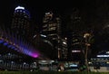 November 2019, Indonesia Nightscape of Modern South Jakarta with a new pedestrian bridge in the night near Transjakarta shelter