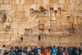 November 27, 2022 - Jerusalem, Israel. Tourist crowd and Jewish gather for Shacharit sunrise prayer at Old City Western Royalty Free Stock Photo