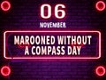 06 November, Marooned without a Compass Day, Neon Text Effect on Bricks Background
