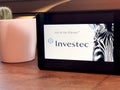 November 2019 Milan, Italy: Investec company logo icon on tablet screen close-up. Investec visual brand