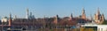 Moscow, Russia - Tourists admire the panorama of the Moscow Kremlin and St Basils Cathedral from Zaryadye Park Royalty Free Stock Photo