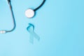 November Prostate Cancer Awareness, light Blue Ribbon with stethoscope for supporting people living and illness. Men Healthcare,