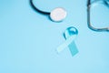 November Prostate Cancer Awareness, light Blue Ribbon with stethoscope for supporting people living and illness. Men Healthcare,
