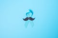 November Prostate Cancer Awareness month, light Blue Ribbon with mustache for supporting people living and illness. Healthcare,