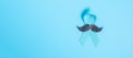 November Prostate Cancer Awareness month, light Blue Ribbon with mustache for supporting people living and illness. Healthcare,