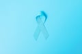 November Prostate Cancer Awareness month, light Blue Ribbon for supporting people living and illness. Healthcare, International