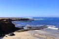 November 19 2023 - Puerto de la Cruz, Jandia, Fuerteventura, Spain: people at the rocky Playa de los Ojos - Los Ojos Beach