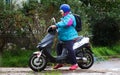 November, 2018 Russia St. Petersburg, Nazia village, grandmother on a moped Royalty Free Stock Photo