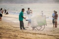 18 November 2012. The seller of roasted corn on the Bali Jimbaran beach Royalty Free Stock Photo