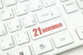 November 21st . Day 21 of month, Calendar date. Cropped view of Modern White Computer Keyboard with calendar date. Concept