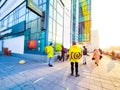 November 2, 2021, St. Petersburg, Russia, Walking couriers with yellow backpacks await orders from McDonald`s Royalty Free Stock Photo