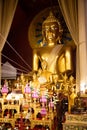 November 21th, 2018 - Ayutthaya & x28;THAILAND& x29; - Giant golden Buddha surrounded by smaller golden Buddhas in thai temple Royalty Free Stock Photo