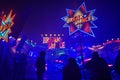 Germany: Carousel in neon blue light on a fairground