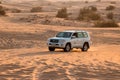 11 November 2021, UAE, Dubai: Desert Safari along the sand dunes in Dubai or Abu Dhabi, UAE - traditional entertainment for Royalty Free Stock Photo