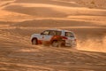 11 November 2021, UAE, Dubai: Desert Safari along the sand dunes in Dubai or Abu Dhabi, UAE - traditional entertainment for Royalty Free Stock Photo