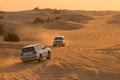 11 November 2021, UAE, Dubai: Desert Safari along the sand dunes in Dubai or Abu Dhabi, UAE - traditional entertainment for Royalty Free Stock Photo