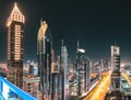 Night view of the spectacular landscape of Dubai with high-rises and skyscrapers at the Sheikh Zayed