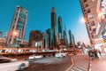 Sheikh Zayed road and numerous hotels and skyscrapers at night in Dubai Royalty Free Stock Photo