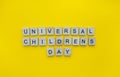 Universal Childrens Day, minimalistic banner with the inscription in wooden letters