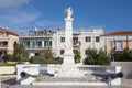 NOVEMBER 30, 2019: White obelisk monument on Aegina Island in Greece. Translation: Honour of King George First