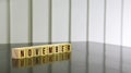 NOVEMBER word on wooden cube on black gloss wooden table. Royalty Free Stock Photo