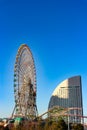 2018 November 03. Yokohama Japan. a giant Cosmo Clock 21 Ferris wheel in evening time with clear blue sky as background Royalty Free Stock Photo