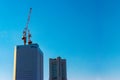 2018 November 03. YOKOHAMA JAPAN. a high building and construction crane at the top with blue sky as background