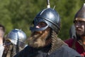 Portrait of a medieval warrior in a Viking helmet (Gjermundbu helmet)