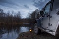 Novgorod region, Russian Luga River, Russia, April 10, 2016 , travel by Jeep Wrangler