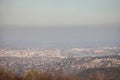 Aerial panoramal of Novi Sad, seen from a hill of Fruska Gora National park, with a focus on the Danube and the main bridges