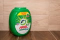 Ariel mountain spring laundry detergent 3 in 1 pods family pack on ceramic tiles, wooden