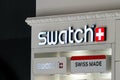 Novi Sad, Serbia - January 28, 2023: Brand logo sign of Swatch store in Promenada shopping mall in Novi Sad, Serbia