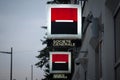 NOVI SAD, SERBIA - MARCH 11, 2017: Logo of the Societe Generale Srbija Bank illuminated in the evening on a branch Novi Sad, Serbi